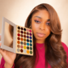 CJAY Beauty model presenting the 35-color eyeshadow palette